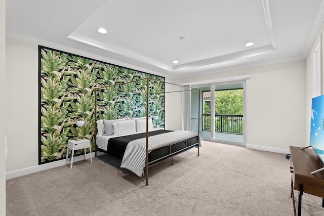 bedroom featuring access to outside, a raised ceiling, crown molding, and light colored carpet