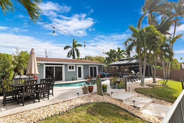 view of pool featuring a gazebo, a yard, and a patio area