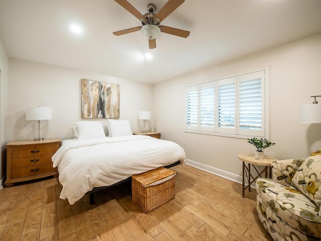 bedroom featuring ceiling fan and light hardwood / wood-style floors