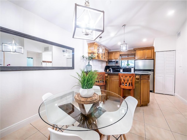 dining space with light tile patterned floors