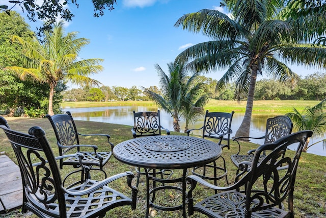 view of patio with a water view