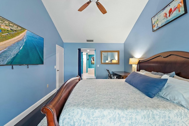 bedroom with ceiling fan and lofted ceiling