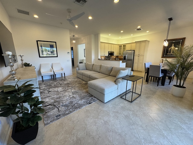 living room featuring ceiling fan