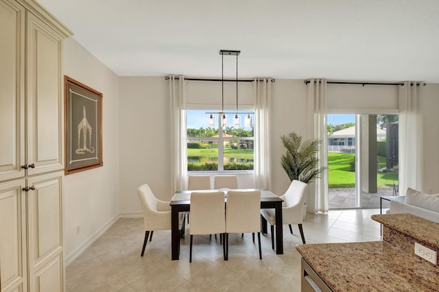 dining room featuring light tile patterned floors