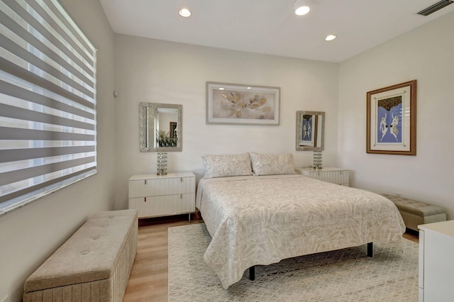 bedroom featuring light hardwood / wood-style flooring