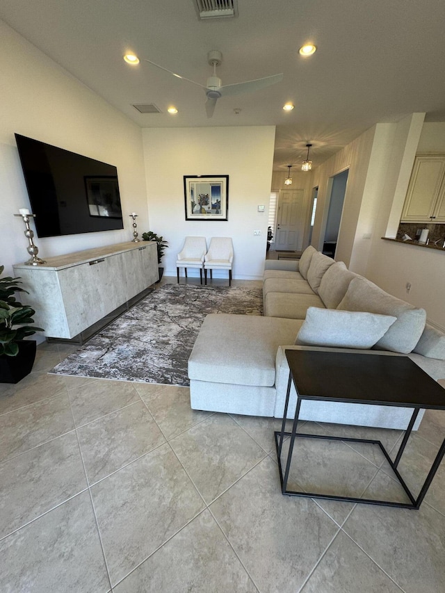 living room featuring ceiling fan