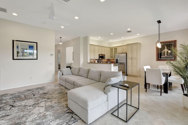 living room featuring ceiling fan