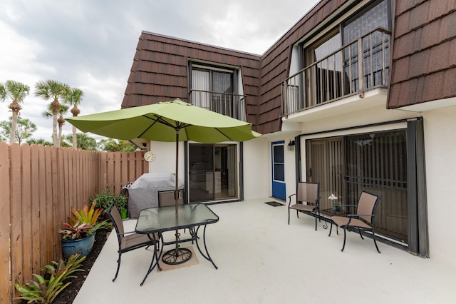 view of patio / terrace featuring a balcony