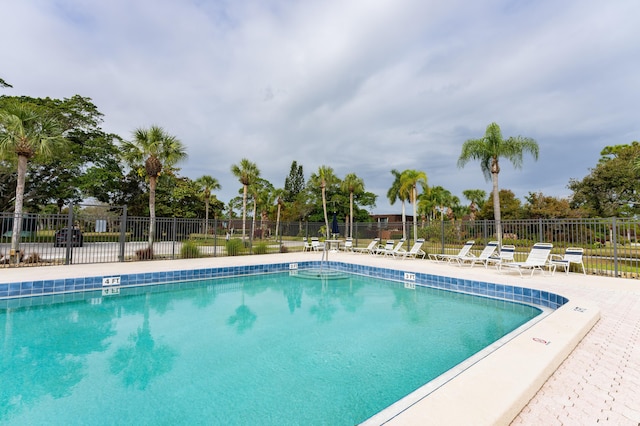 view of pool featuring a patio