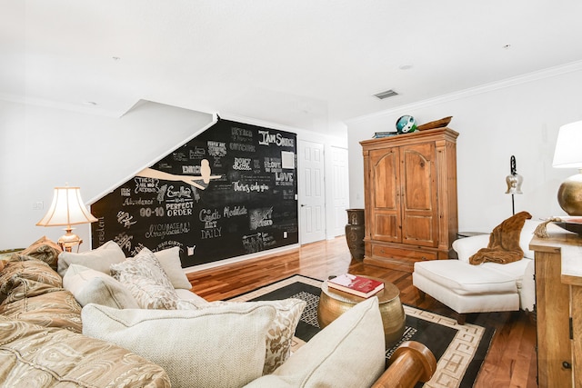 living room featuring crown molding and dark hardwood / wood-style flooring