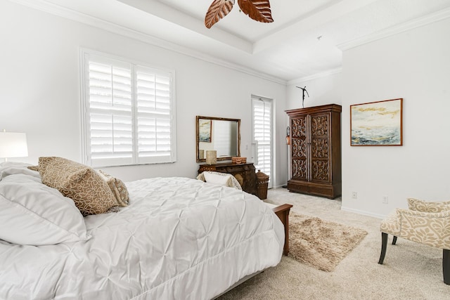 bedroom with carpet, ceiling fan, and ornamental molding