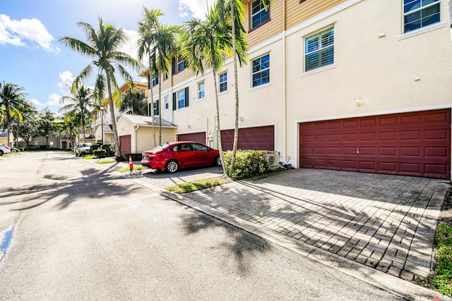 exterior space with a garage