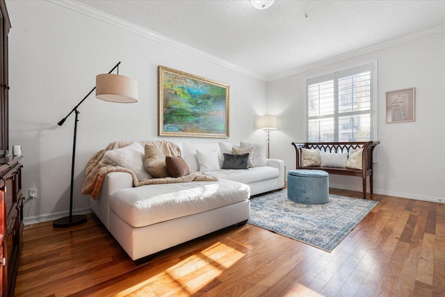 living room featuring crown molding, dark hardwood / wood-style flooring, and a textured ceiling