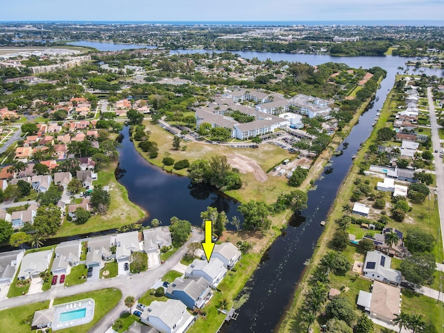 drone / aerial view featuring a water view