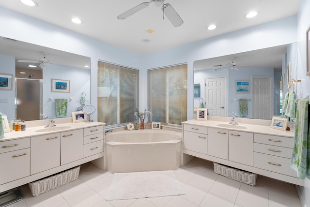 bathroom featuring separate shower and tub, tile patterned flooring, and vanity