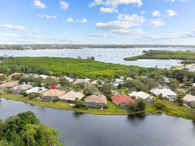 drone / aerial view featuring a water view