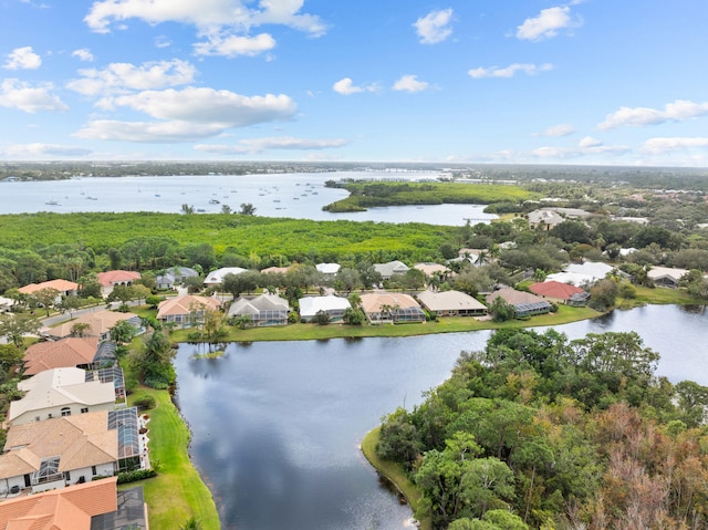 drone / aerial view with a water view