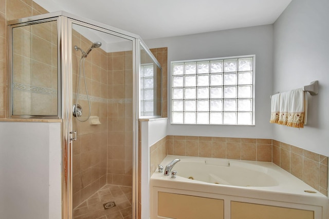 bathroom featuring plus walk in shower