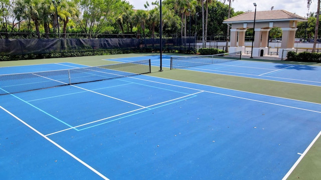 view of tennis court with basketball court