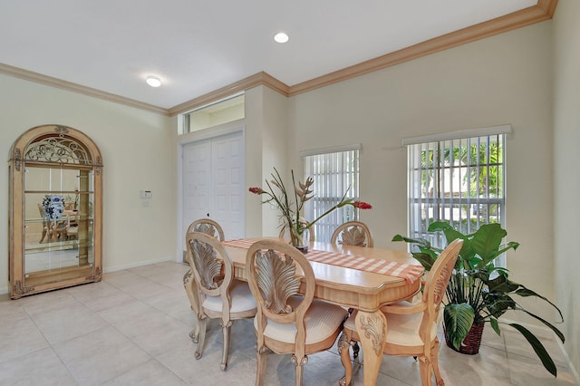 dining room featuring crown molding