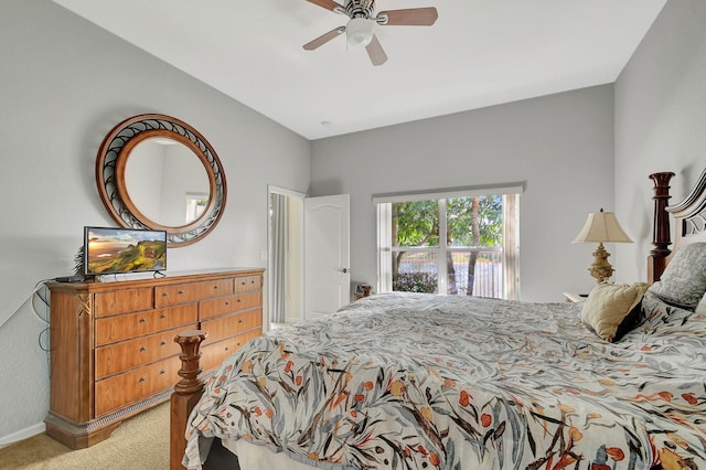 bedroom with ceiling fan and light colored carpet