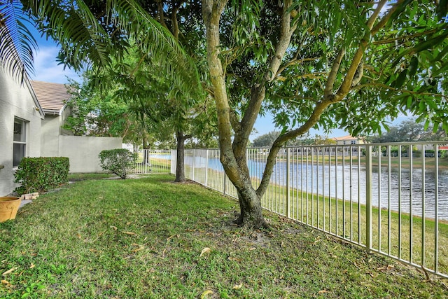 view of yard with a water view