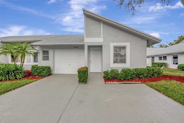 view of front of property featuring a garage