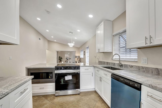 kitchen with appliances with stainless steel finishes, light stone counters, sink, light tile patterned floors, and white cabinets