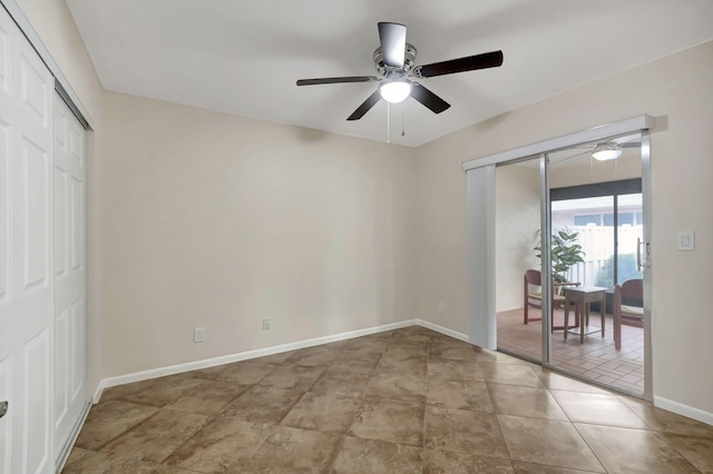 unfurnished room featuring ceiling fan