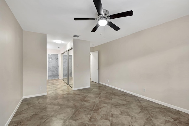 unfurnished room featuring ceiling fan