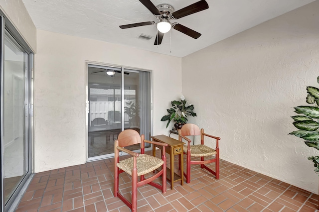 view of patio with ceiling fan