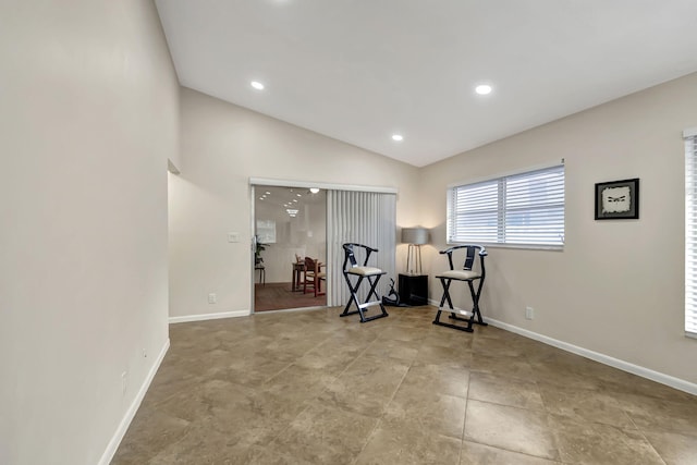 workout area with vaulted ceiling