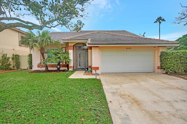 ranch-style home with an attached garage, driveway, a tiled roof, stucco siding, and a front yard