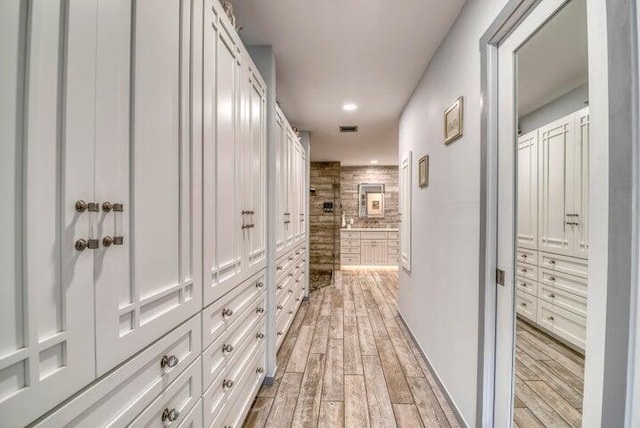 hallway featuring light wood-type flooring