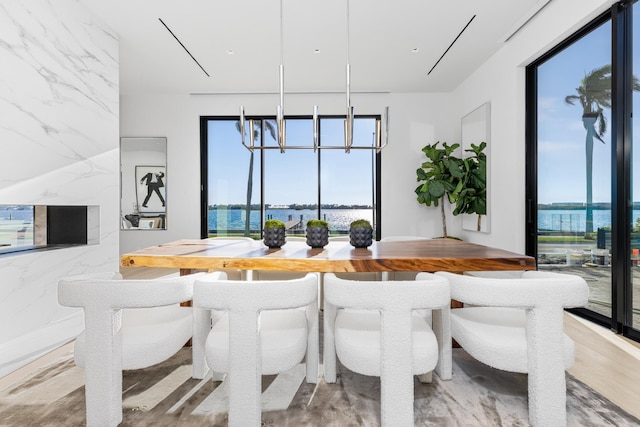 dining room with a water view