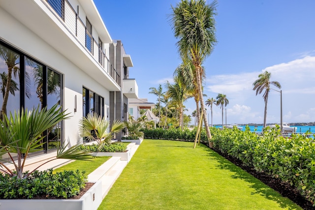 view of yard with a water view