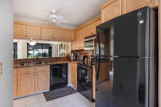 kitchen with black appliances, sink, ceiling fan, a textured ceiling, and light brown cabinetry