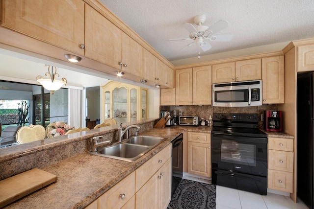 kitchen featuring black appliances, light tile patterned floors, sink, and light brown cabinetry