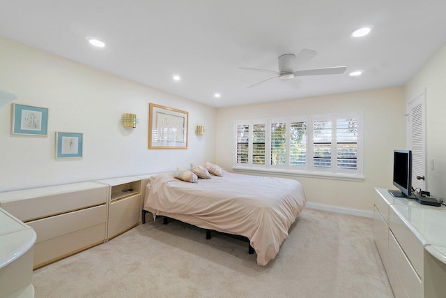 carpeted bedroom featuring ceiling fan