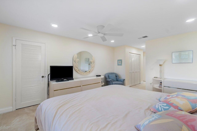 carpeted bedroom with ceiling fan