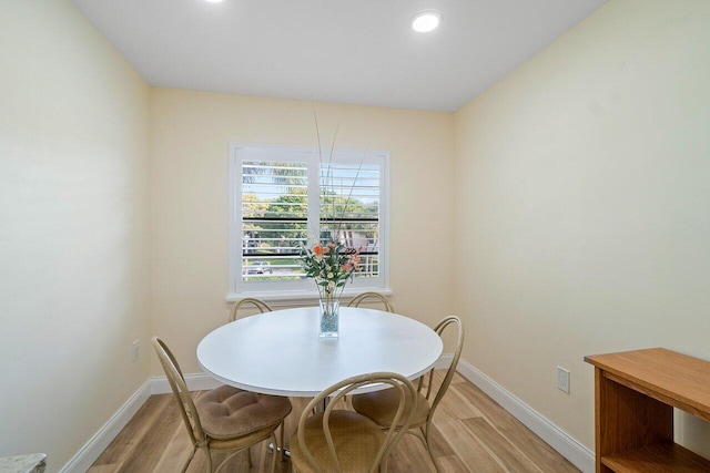 dining room with light wood-type flooring