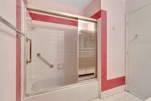 bathroom featuring combined bath / shower with glass door and tile patterned floors