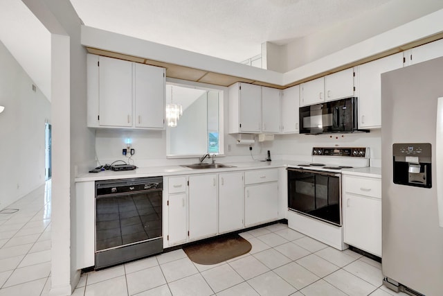 kitchen with white cabinetry, sink, hanging light fixtures, light tile patterned flooring, and black appliances