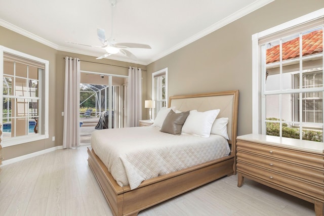 bedroom featuring access to outside, multiple windows, light hardwood / wood-style floors, and ceiling fan