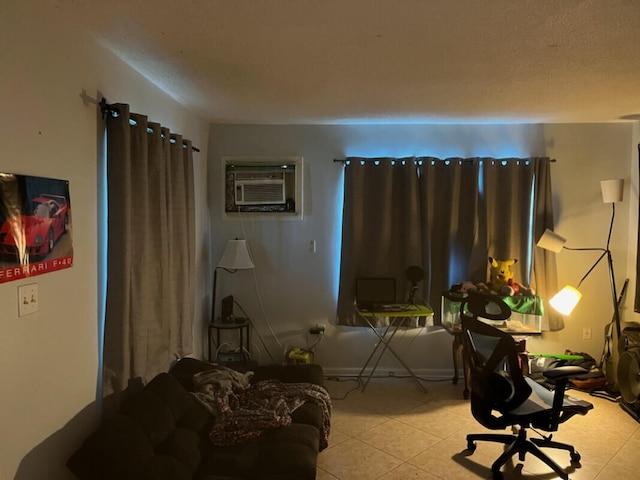 sitting room with a wall mounted air conditioner