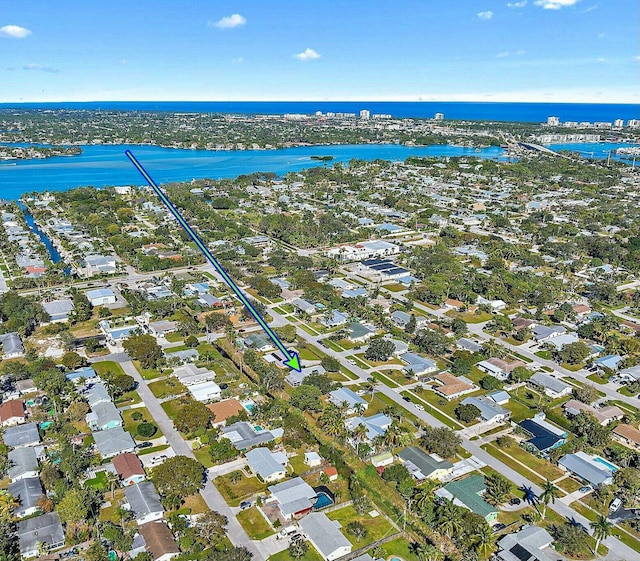 drone / aerial view with a water view