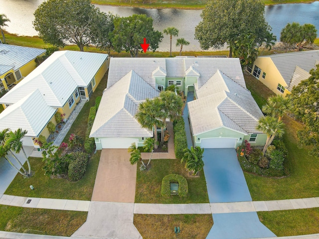 drone / aerial view featuring a water view