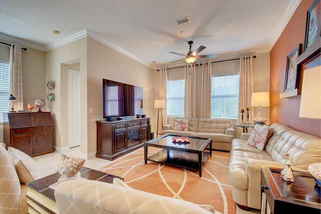 living room featuring ceiling fan and ornamental molding