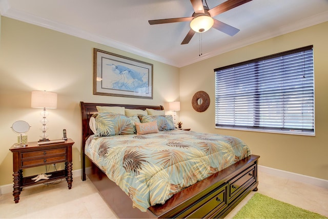 bedroom with ceiling fan and crown molding