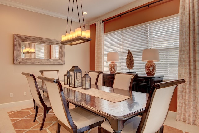 dining space featuring light tile patterned floors and ornamental molding